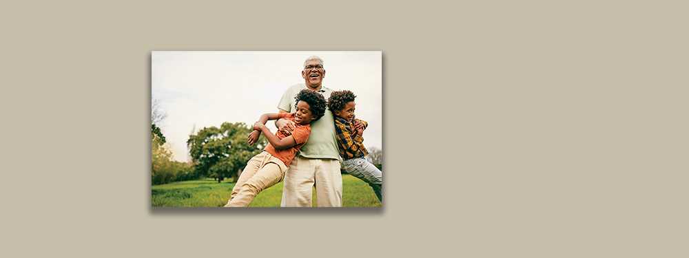 Picture of a family playing outside.